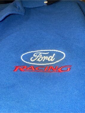 Ford Blue Polo with White Oval Logo and Red Racing Text